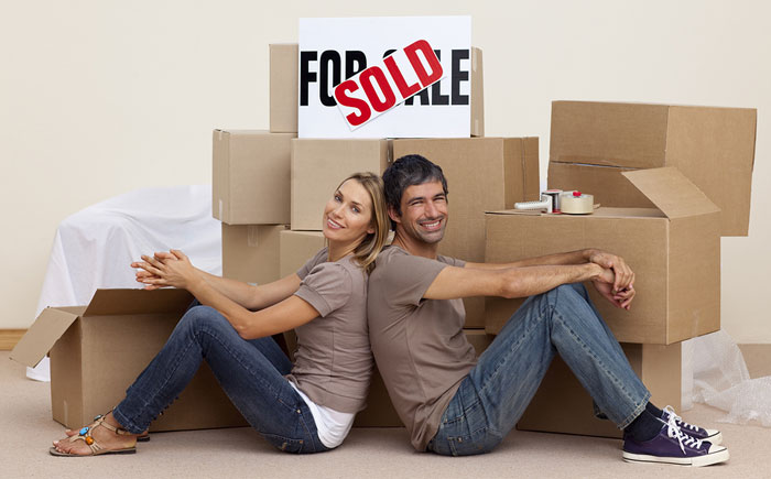 Couple with packing boxes